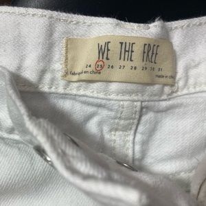 Free People White Distressed denim shorts